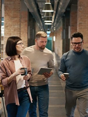 pexels-3182787 Business Team Walking Down Hallway