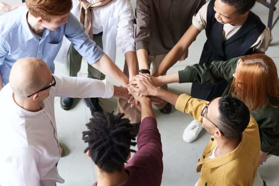 Business Team Hands In Corporate Training Meeting